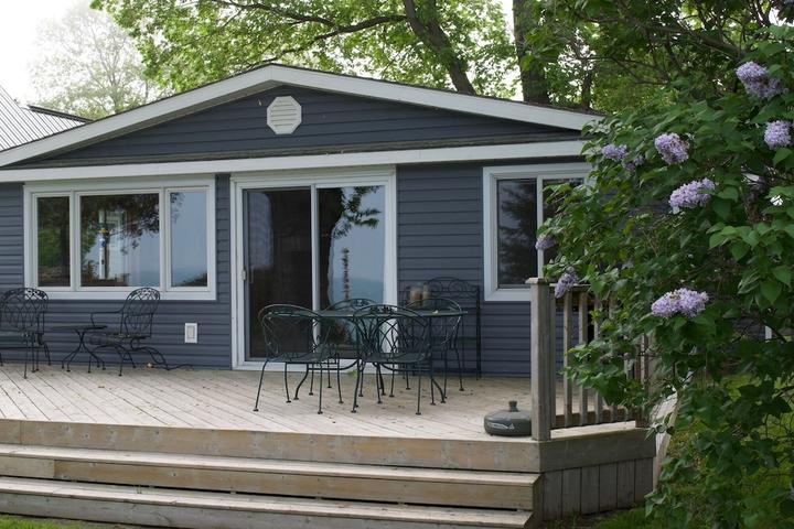 Pet Friendly Lakefront Cottage with Private Beach