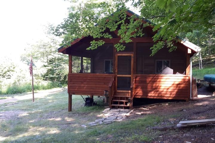Pet Friendly Rustic Cabin on Cacapon River for Private Getaway