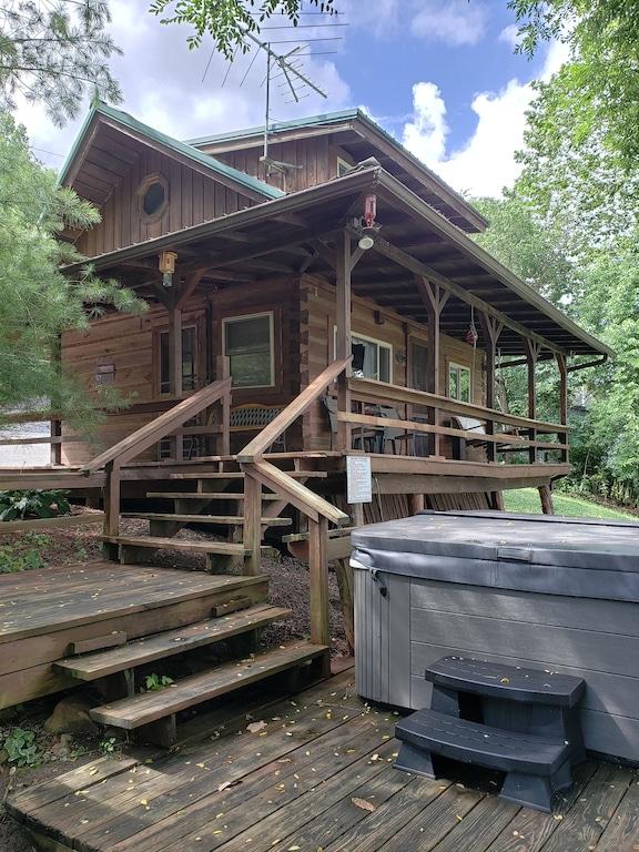 Pet Friendly Riverfront Cabin with Hot Tub