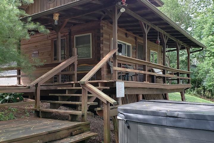 Pet Friendly Riverfront Cabin with Hot Tub