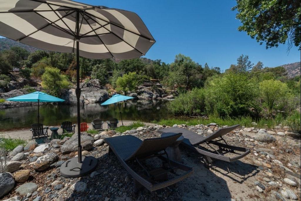 Pet Friendly 7/5 Riverfront Villa with Tranquil Swimming Hole