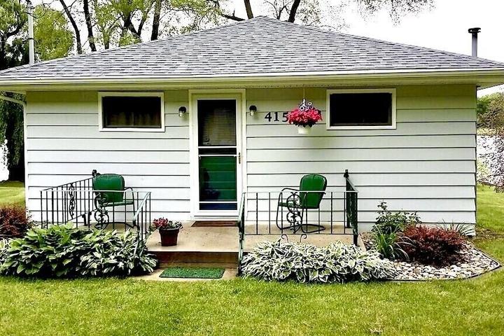 Pet Friendly Cozy Lake Cottage with Patio & Private Dock