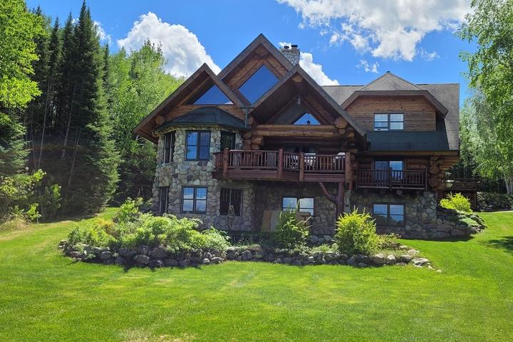 Pet Friendly Luxury Log Home on Private Sand Beach & Trails