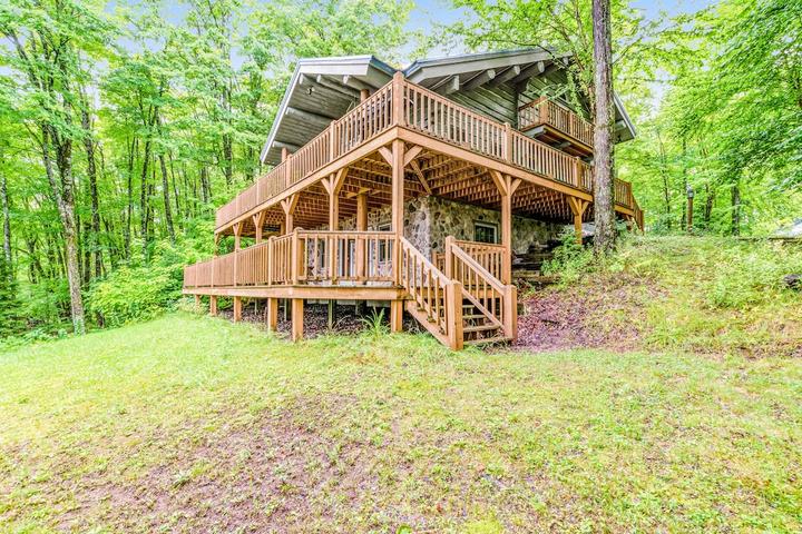 Pet Friendly Lakefront Home with a Wood Fireplace & Dock