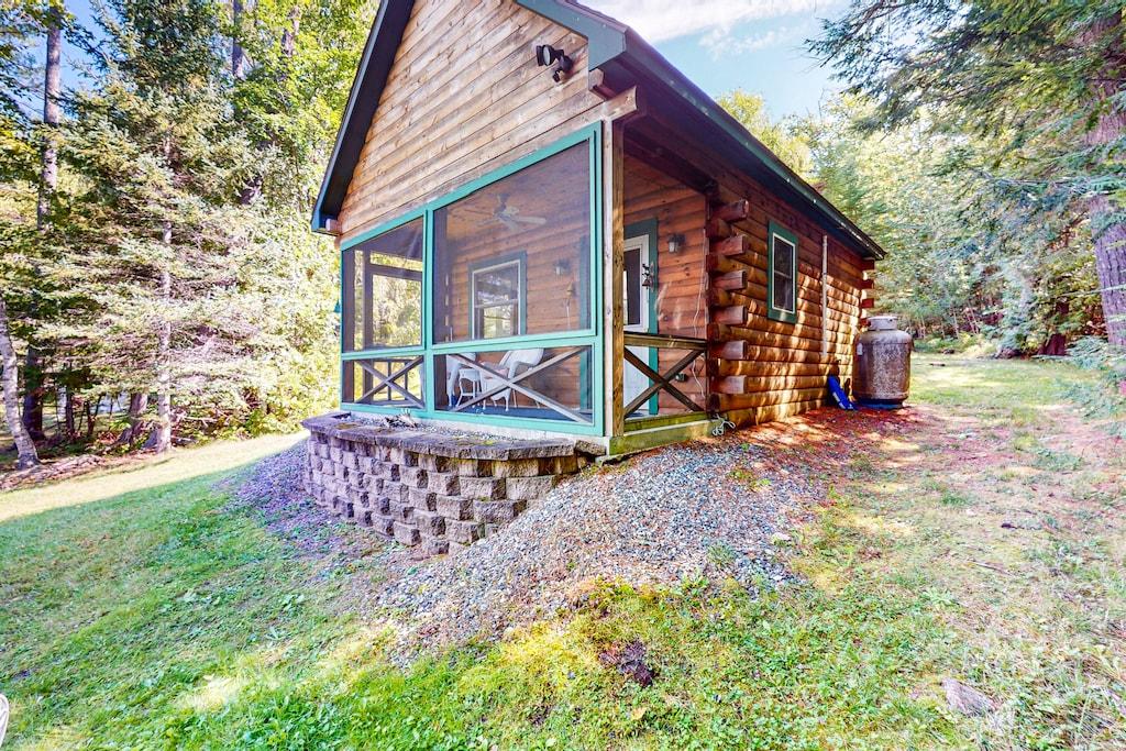 Pet Friendly Lakefront Cottage with Porch & Lake Access