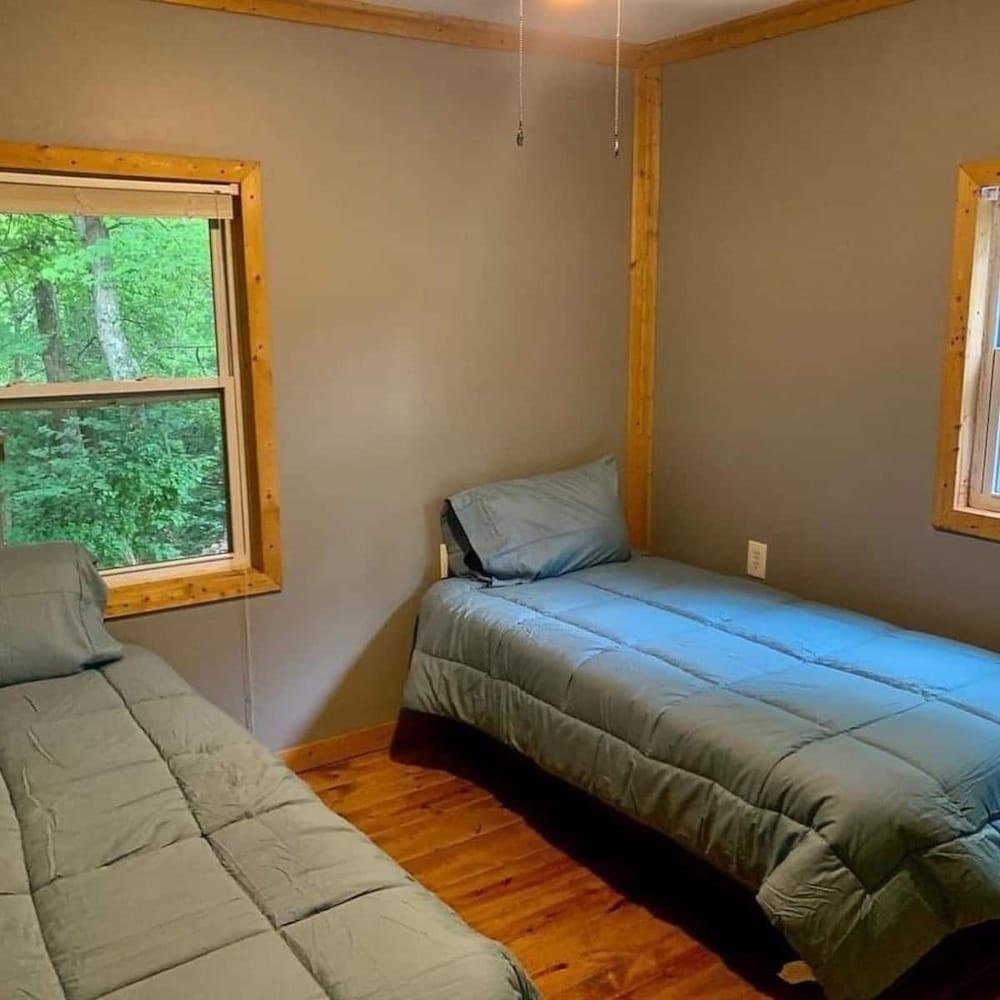 Pet Friendly Cabin with a Pond on 40 Acres