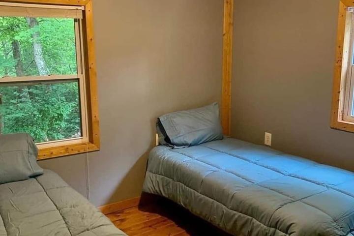 Pet Friendly Cabin with a Pond on 40 Acres