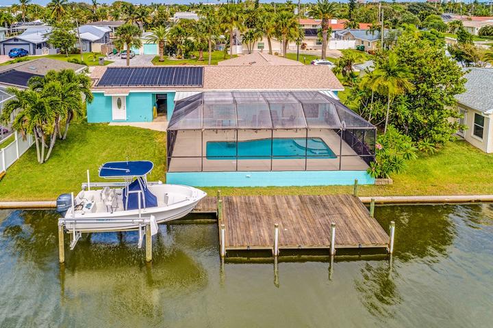Pet Friendly Riverfront Home with Private Heated Pool & Dock
