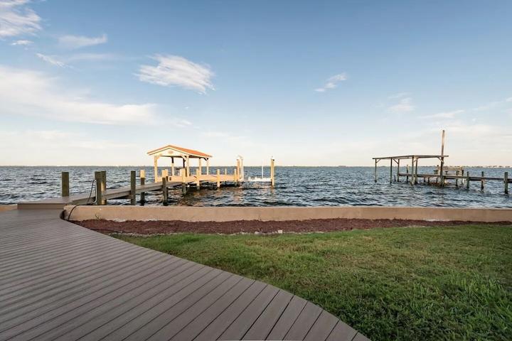 Pet Friendly 4/2 Waterfront Home with Dock Minutes from Beach