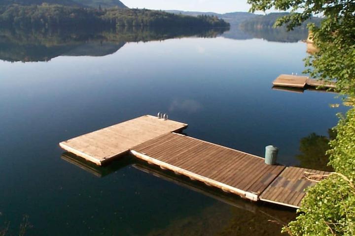 Pet Friendly Lake Front Home on Acre with Hot Tub & Dock