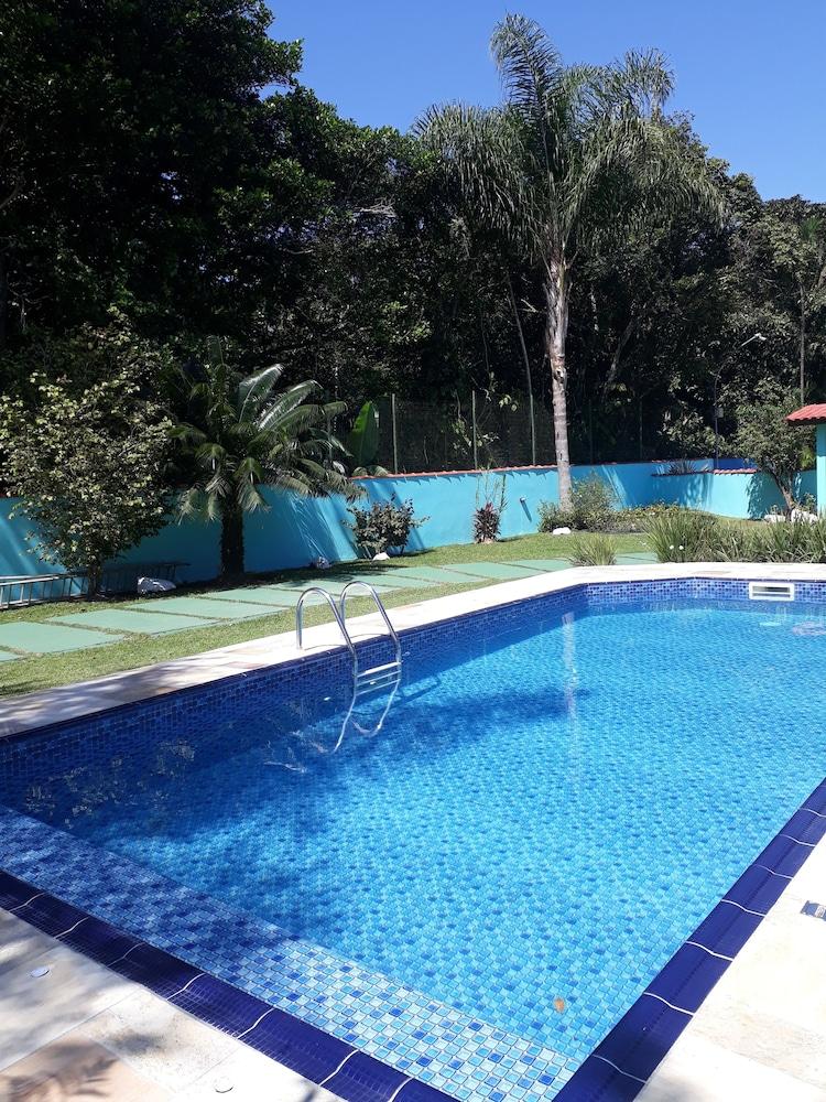 Pet Friendly Tropical Paradise Home with Pool Near Beach