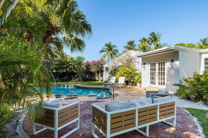 Pet Friendly Tropical Home with Heated Pool & Guest House