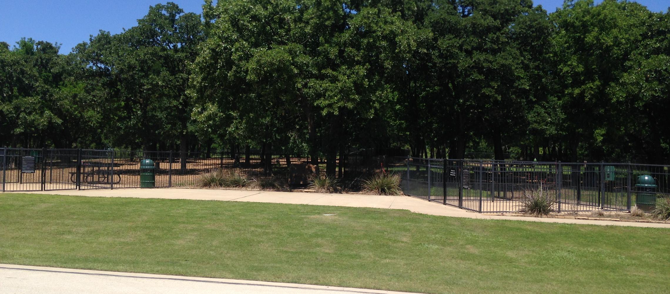 Little dog park on the right big dog on the left. Little dog park on the right big dog on the left.