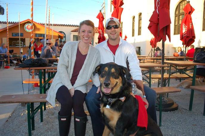 Barktoberfest Is a Pet-Friendly Fall Event Held in St Louis, MO. A Couple Hangs Out In the Beer Garden of Saint Louis Barktoberfest.