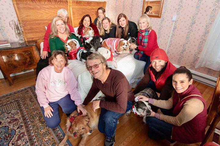 Slumber Party Attendees Pose for a Photo at the Dog-Friendly Event at the Wilburton Inn.