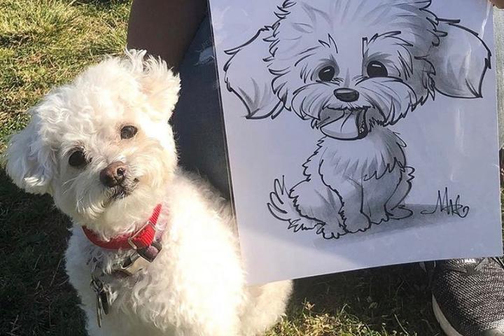 A Dog Poses Beside Caricature of Herself at the Doggie Street Festival in Phoenix.