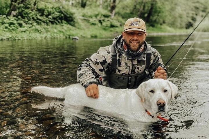 Man on a Fishing Trip With His Dog