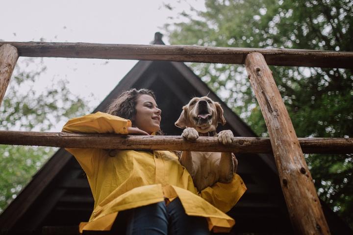 A girl and her dog at a pet-friendly vacation rental.