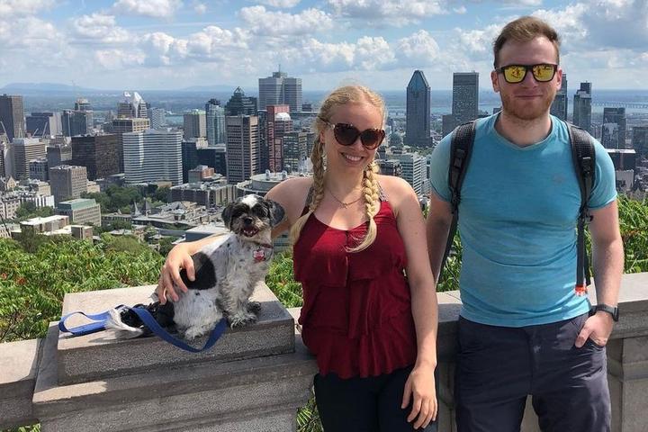 A couple visit Montreal with their dog.