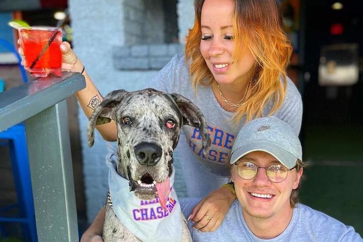 Couple and a Great Dane at dog-friendly Pups Pub