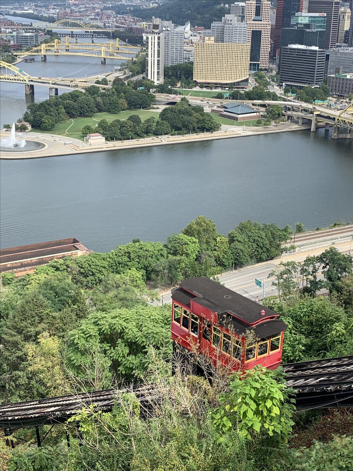 A view of the cable car and nearby river at Duquesne Incline, a pet-friendly attraction in Pittsburgh, PA.