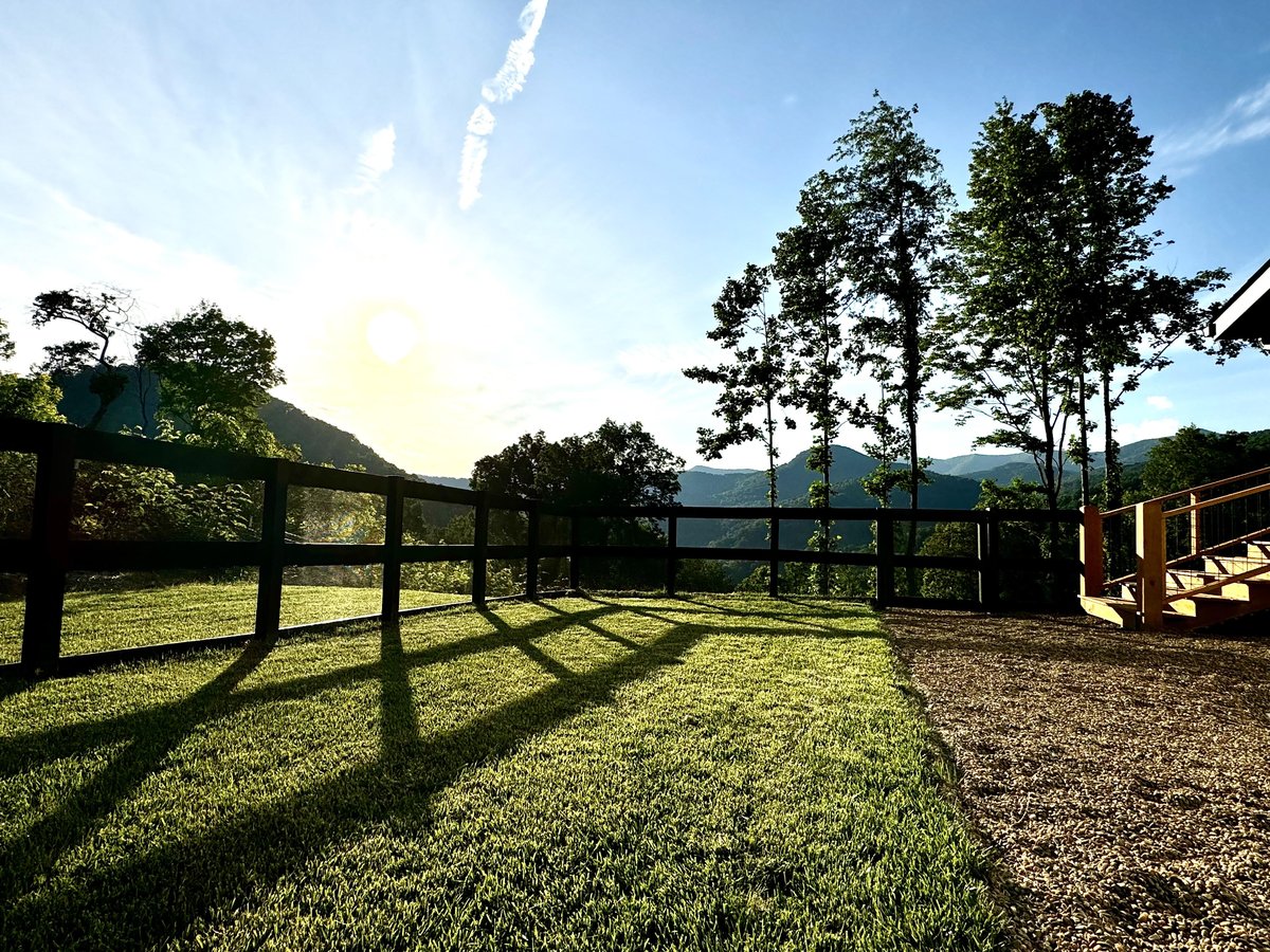 Dogs can enjoy the fenced yard at this pet-friendly vacation rental in Swannanoa, NC.