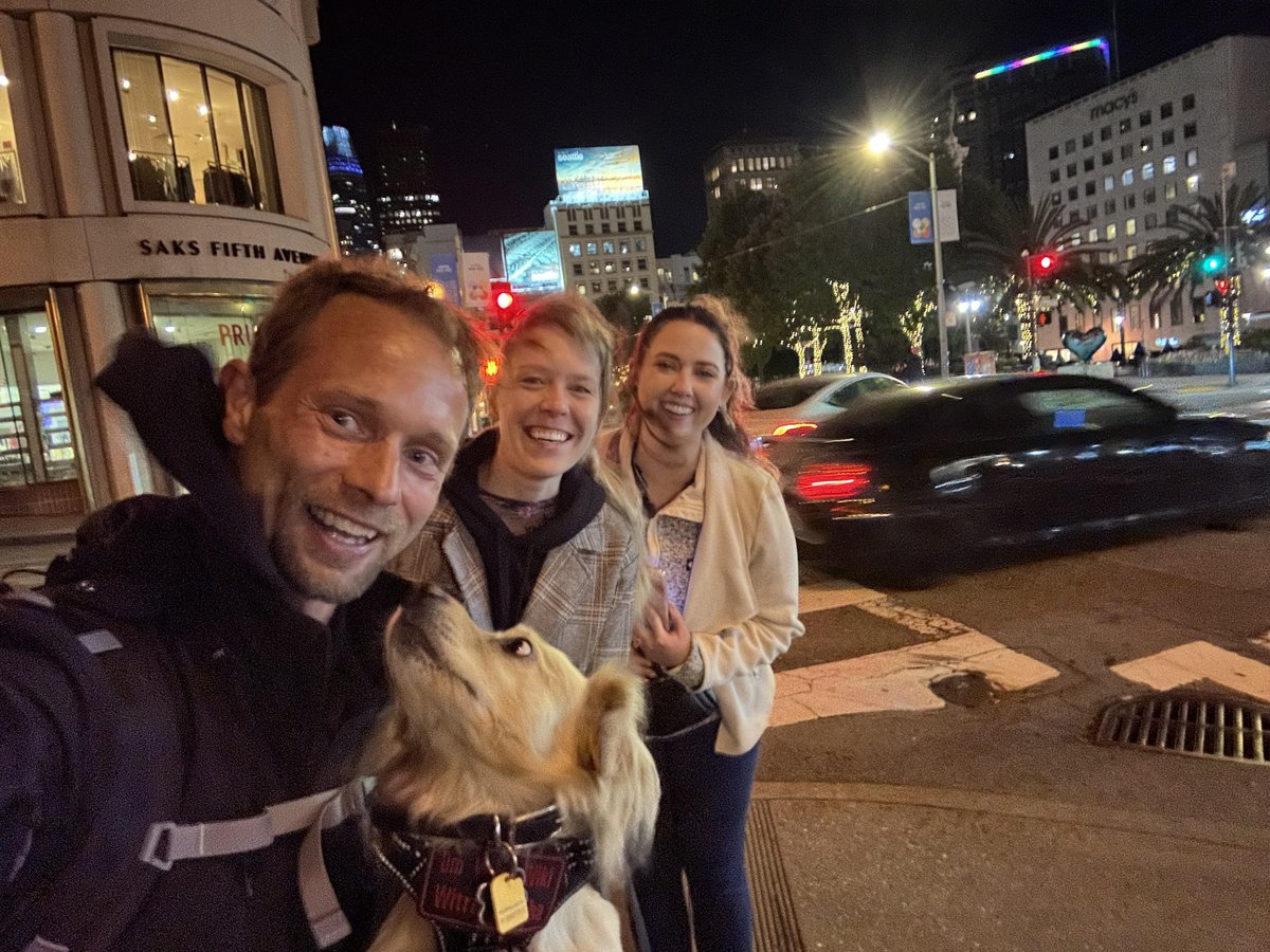 A group of friends with a small pup enjoying a dog-friendly US Ghost Adventures tour in Tahoe City, CA.