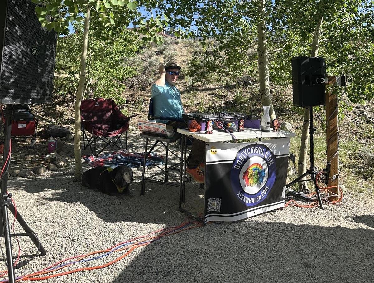 A DJ playing music at Leadville, CO's pet-friendly Ale Yak brewpub.