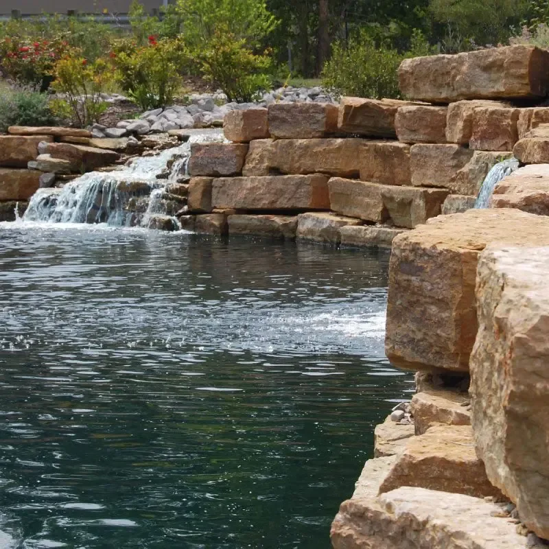 Stacked tan limestone rocks sit at pet-friendly The Arlington Memorial Gardens in Cincinnati, OH.