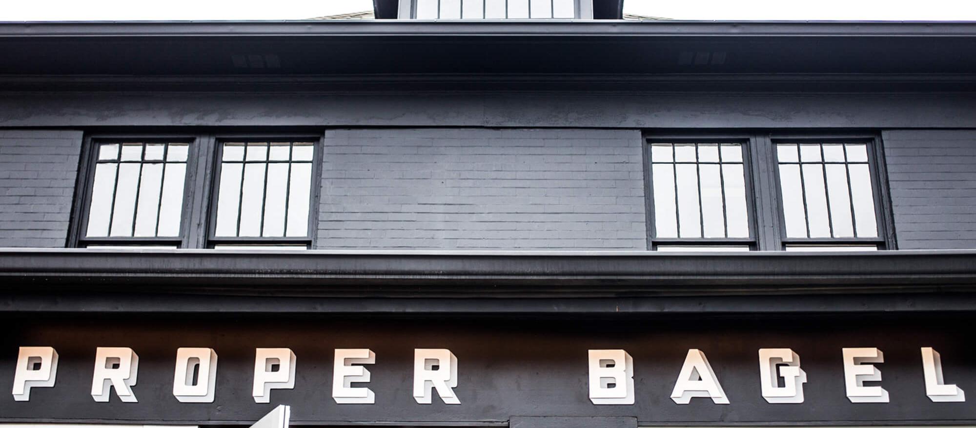Exterior picture of Proper Bagel, a dog friendly restaurant in Nashville. Exterior picture of Proper Bagel, a dog friendly restaurant in Nashville.